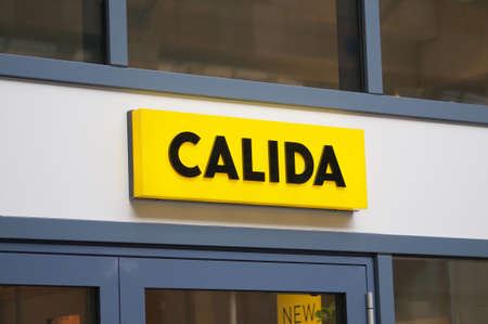 Zug, Switzerland - 26th February 2021 : Calida sign hangin in front of a store in Zug, Switzerland. Calida is a Swiss brand specialized in underwear, sleepwear, and loungewearのeditorial素材