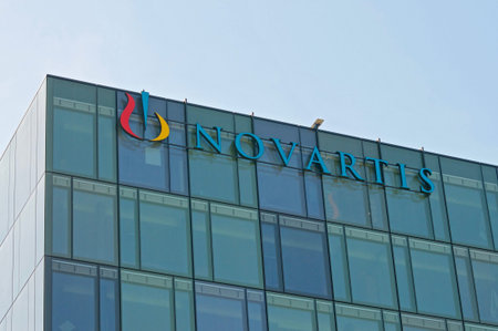 Rotkreuz, Zug, Switzerland - 28th March 2021 : Novartis sign hanging at the building in Rotkreuz,...