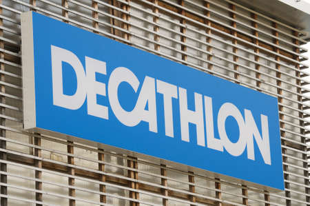 Sant'Antonino, Ticino, Switzerland - 26th March 2021 : Decathlon store sign hanging on a building in San Antonino. Decathlon is a french sporting goods retailer and the largest in the worldのeditorial素材
