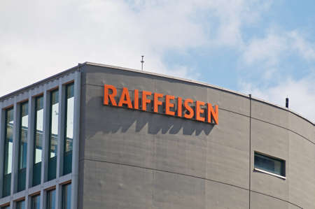 St. Gallen, Switzerland - 14th April 2021 : Raiffeisen bank sign hanging on the headquarters building in St. Gallen. Raiffeisen is a Swiss cooperative bank, the third largest bank in Switzerlandのeditorial素材