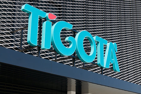 Bioggio, Ticino, Switzerland - 25th April 2021 : TigotÃ  sign hanging in front of a building in...