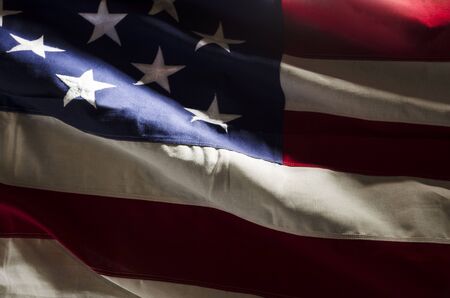 isolated American flag with shadows.の写真素材
