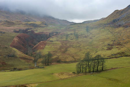 Mist rolling in over the hills in Ardnamurchan, Scotland. Januaryの写真素材