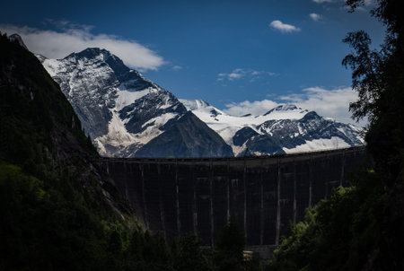 Scenic view on Wasserfallboden See near Kaprun, Austria, Europe. National park Hohe Tauern. Charming lake with amazing deep colorful water and wild clouds on sky.の写真素材