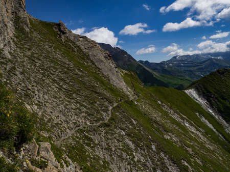 Great views to the peaks, valleys and glaciers of the Austrian Alps, Hohe Tauern national park. Charming and beautiful scene with amazing meadows, near nice city Heiligenblut, Austria, Europe.の写真素材