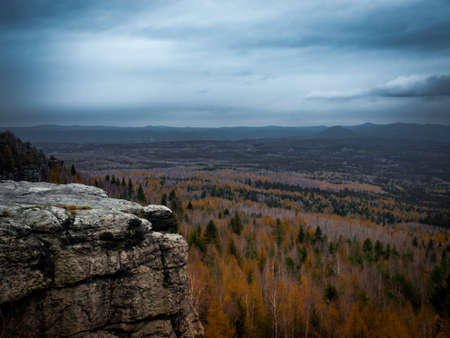 Amazing dark scenery and view to the deep valleys from top of mountains in north of Czech Republic.の写真素材