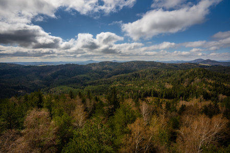 Great view to the amazing and deep forests on the northern Bohemia. Such a nice and calm place with a cool hike.の写真素材
