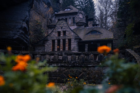 Epic old gasworks building hidden in the forest with amazing moody atmosphere in the fall. This place has such a spirit. Fantasy house for elves.の写真素材
