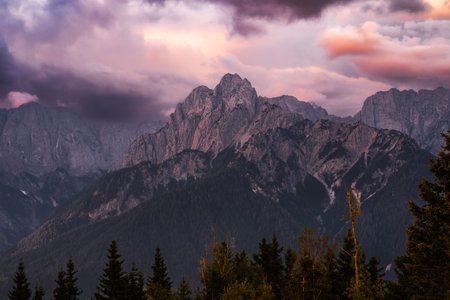 Romantic colorful sunrise in the mountains on the border between Slovenia, Austria and Italy....