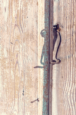 Part of wooden door with hookの写真素材