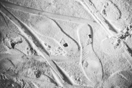 Footprints in the snow. Stylish toned imageの写真素材