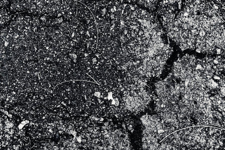 Old asphalt cracked background textureの写真素材