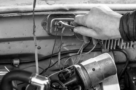 Hand repair car. monochrome photo.の写真素材