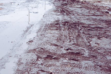 Tire prints in the mudの写真素材