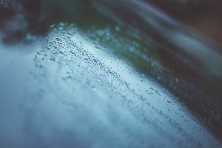Raindrops on the car glassの写真素材