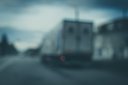 Blurred photo of truck on the roadの写真素材