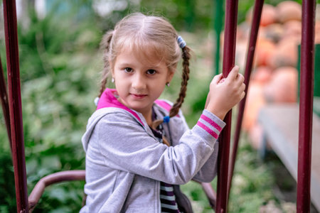 Beautiful summer portrait of a cute little girl