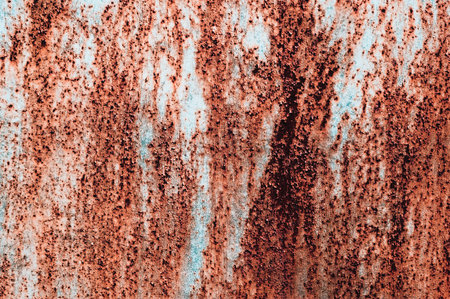 Rusty metal surface background. Peeling paint texture for designer.