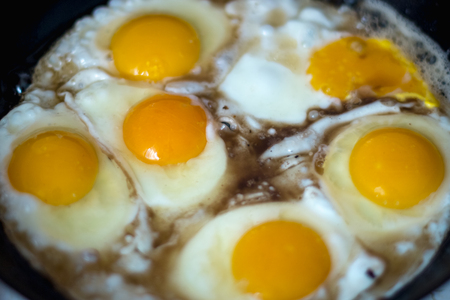 Fried eggs in a frying pan.の写真素材