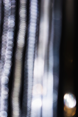 Silver abstract bokeh background for designの写真素材