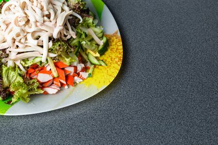 Ingredients for making salad on a green plate. Healthy eating concept.の写真素材