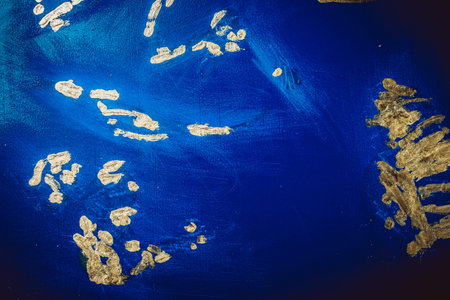 Blue abstract background for design with yellow dots. Painted scratch texture with place for text