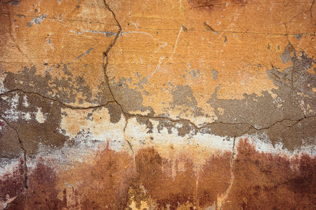 Cracked and peeling paint old wall background. Classic grunge texture