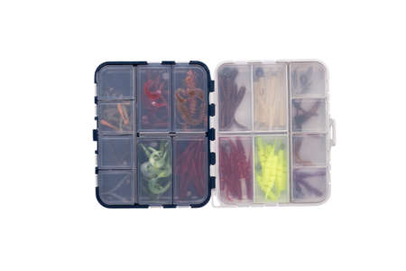 Transparent box with silicone fishing lures isolated on white backgroundの写真素材
