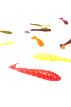 Multicolored silicone baits isolated on white background. Studio photo.の写真素材