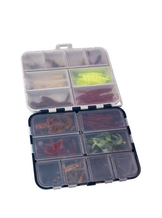 Transparent box with silicone fishing lures isolated on white backgroundの写真素材