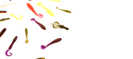 Multicolored silicone baits isolated on white background. Studio photo.の写真素材