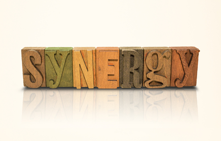 Synergy Word Block Letters on  Isolated White Backgroundの写真素材