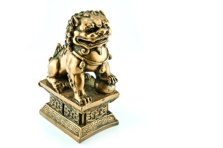 Chinese lion sculpture isolated on white backgroundの写真素材