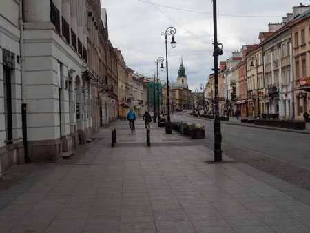 Warsaw/Poland. Streets of capital during coronavirus pandemic, usually very crowded with people or cars, now almost empty. Nowy Swiat street.のeditorial素材