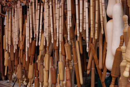 Wooden kitchen utensils on market stall in Kashgar, China