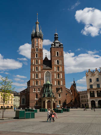 Cracow/Poland - 22/04/2020. Almost empty Main Square in Krakow during coronavirus covid-19 pandemic.  View over Mariacki Church.のeditorial素材