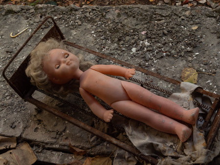 A doll in an abandoned kindergarten building after the explosion of the reactor in Chernobyl. Pripyat Ukraineの写真素材