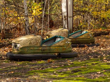 Bumper cars in abandoned amusement park in Pripyat, Chernobyl Exclusion Zone in autumn. Ukraineの写真素材