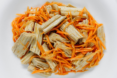 Fuju and korean carrot salad. Meal with yuba made from soybeans. Vegetarian appetizerの写真素材