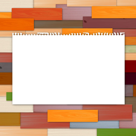 Empty torn paper on colorful wooden backgroundの写真素材