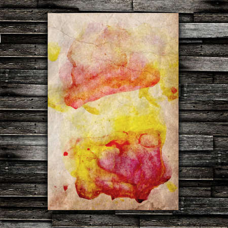 Water color paper on wooden texture backgroundの写真素材