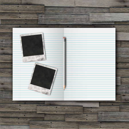 Instant photo pencil and notebook on wood backgroundの写真素材