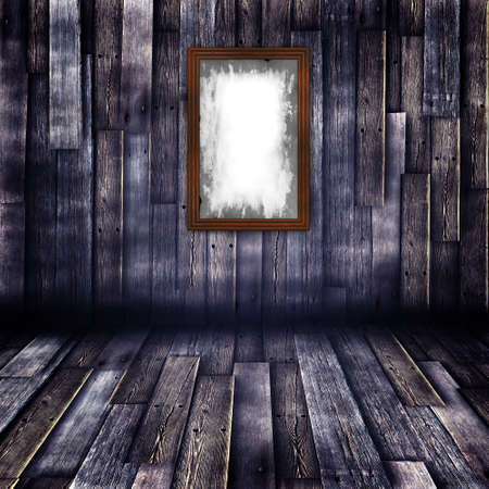 Empty frames in wooden roomの写真素材