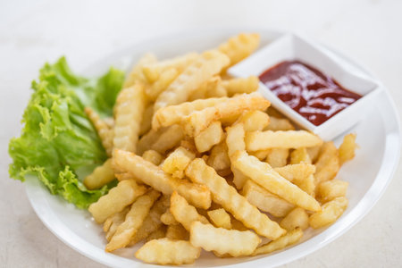 Golden French fries potatoes ready to be eaten 