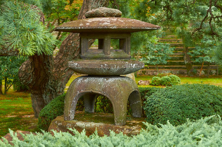 JAPANESE STONE LANTERN : An element in Japanese garden which when Lit, it is considered as an offering to Buddha.の写真素材