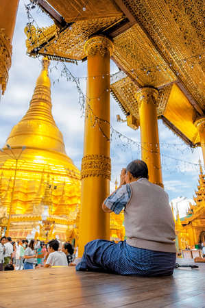 Shwedagon Pagoda, Yangon, Myanmar - Oct 21, 2017: The sacred golden pagoda that symbolize the spiritual bond to all Buddhists in Myanmar.のeditorial素材