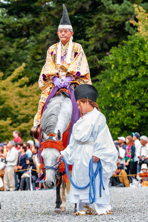 Kyoto, Japan - October 22, 2016: Festival of The Ages, an ancient costume parade held annually. Each participant dressed in an authentic costume of a character in different Japanese feudal periods.のeditorial素材