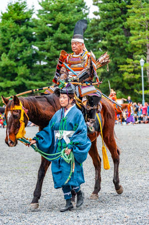 Kyoto, Japan - October 22, 2016: Festival of The Ages, an ancient costume parade held annually. Each participant dressed in an authentic costume of a character in different Japanese feudal periods.のeditorial素材