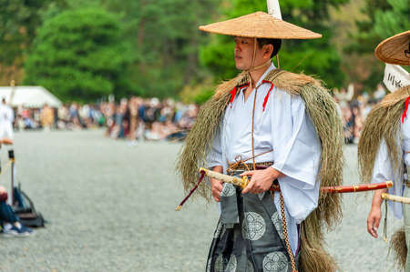 Kyoto, Japan - October 22, 2016: Festival of The Ages, an ancient costume parade held annually. Each participant dressed in an authentic costume of a character in different Japanese feudal periods.のeditorial素材