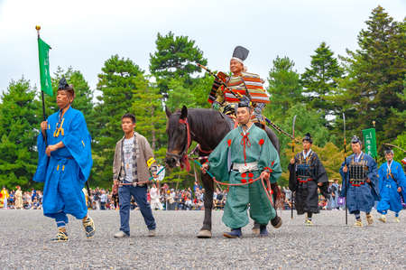 Kyoto, Japan - October 22, 2016: Festival of The Ages, an ancient costume parade held annually. Each participant dressed in an authentic costume of a character in different Japanese feudal periods.のeditorial素材